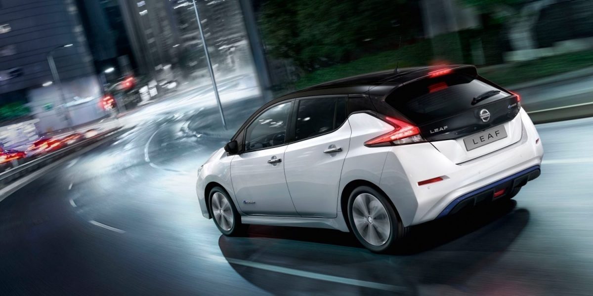 Nissan LEAF driving on a highway with graphic of e-Pedal next to it