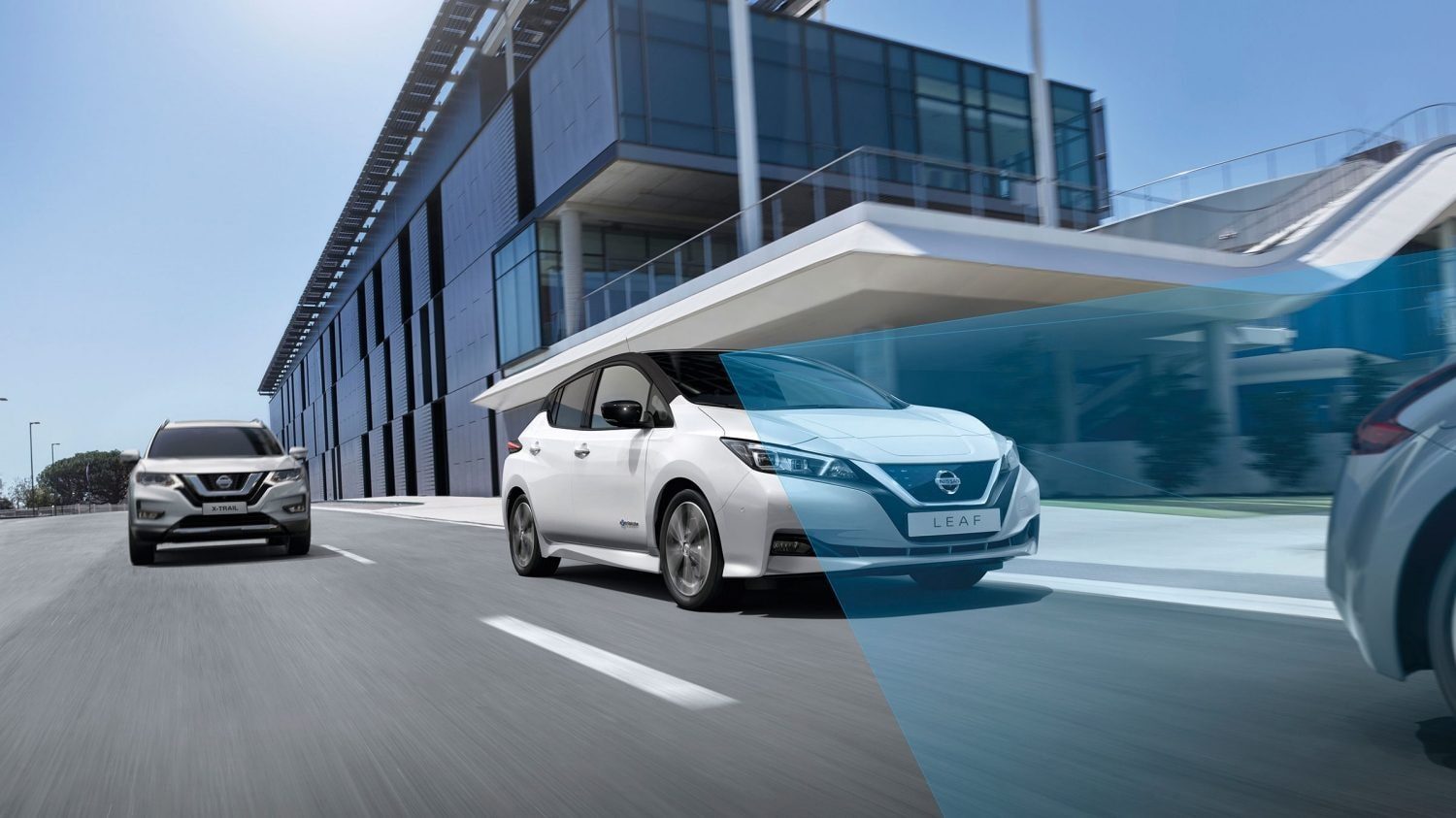 Nissan LEAF driving on a city street