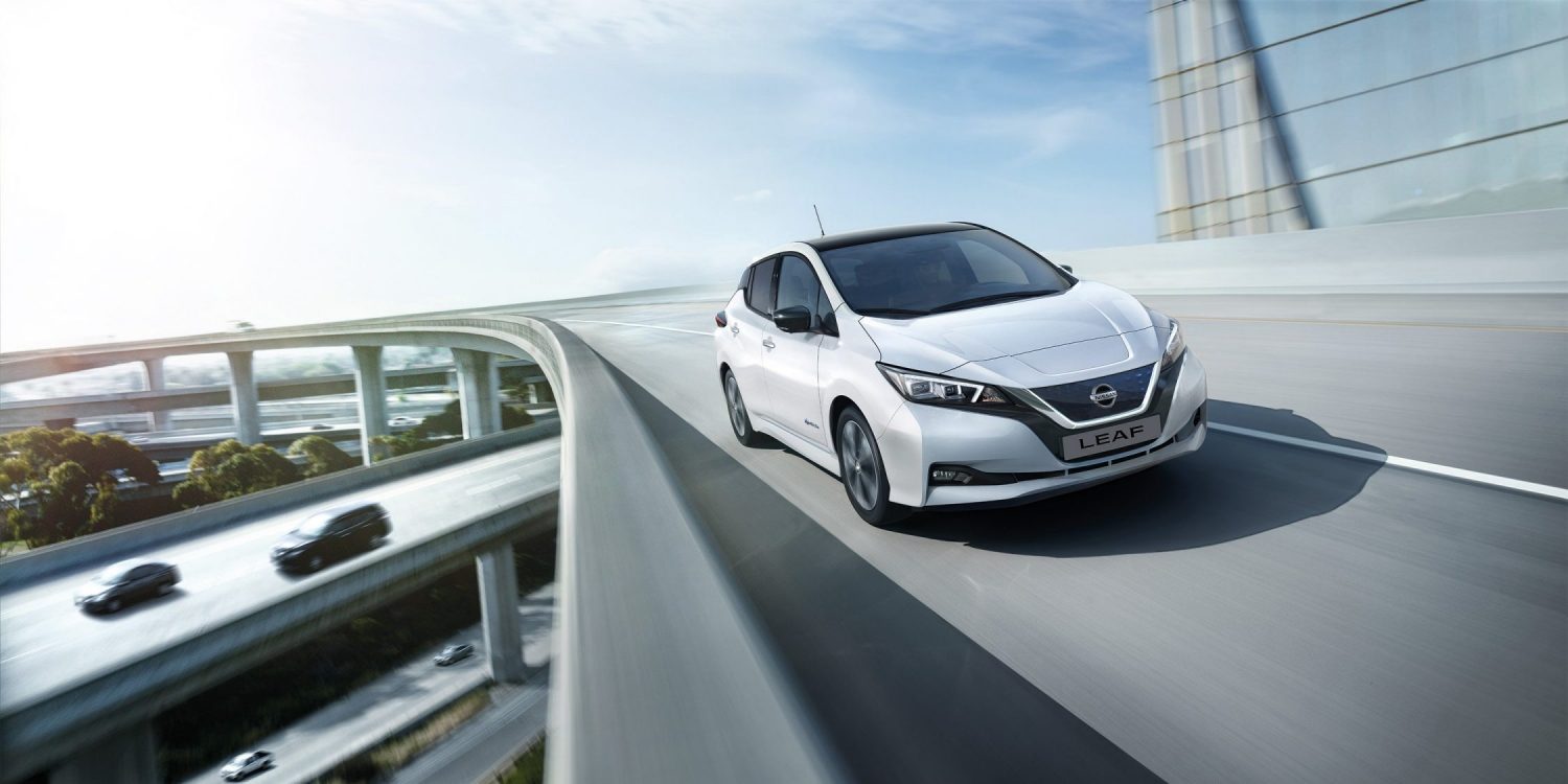 Nissan LEAF driving on a highway with graphic of e-Pedal next to it