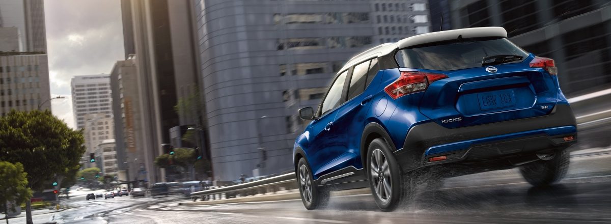 Nissan Kicks driving on a city street