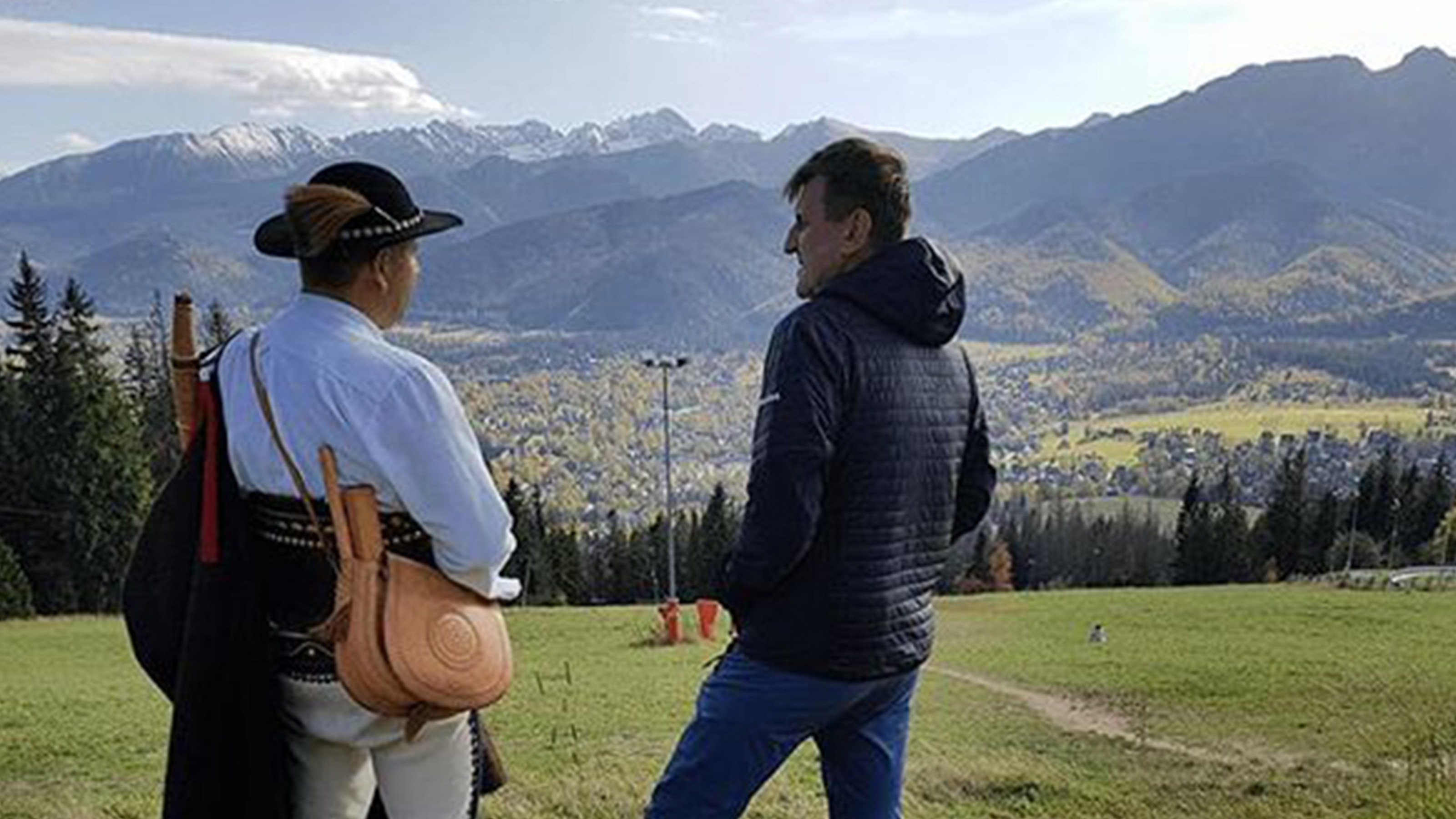 Marek Kaminski chatting with a local on his expedition.