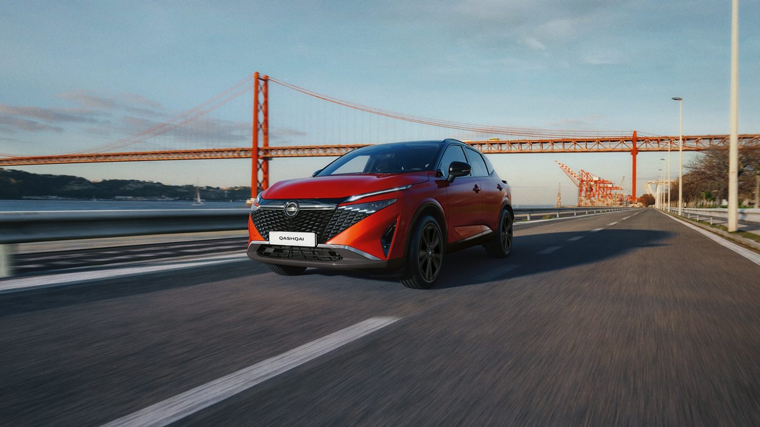 Nissan Qashqai e-Power driving shot on bridge - Hybrid SUV