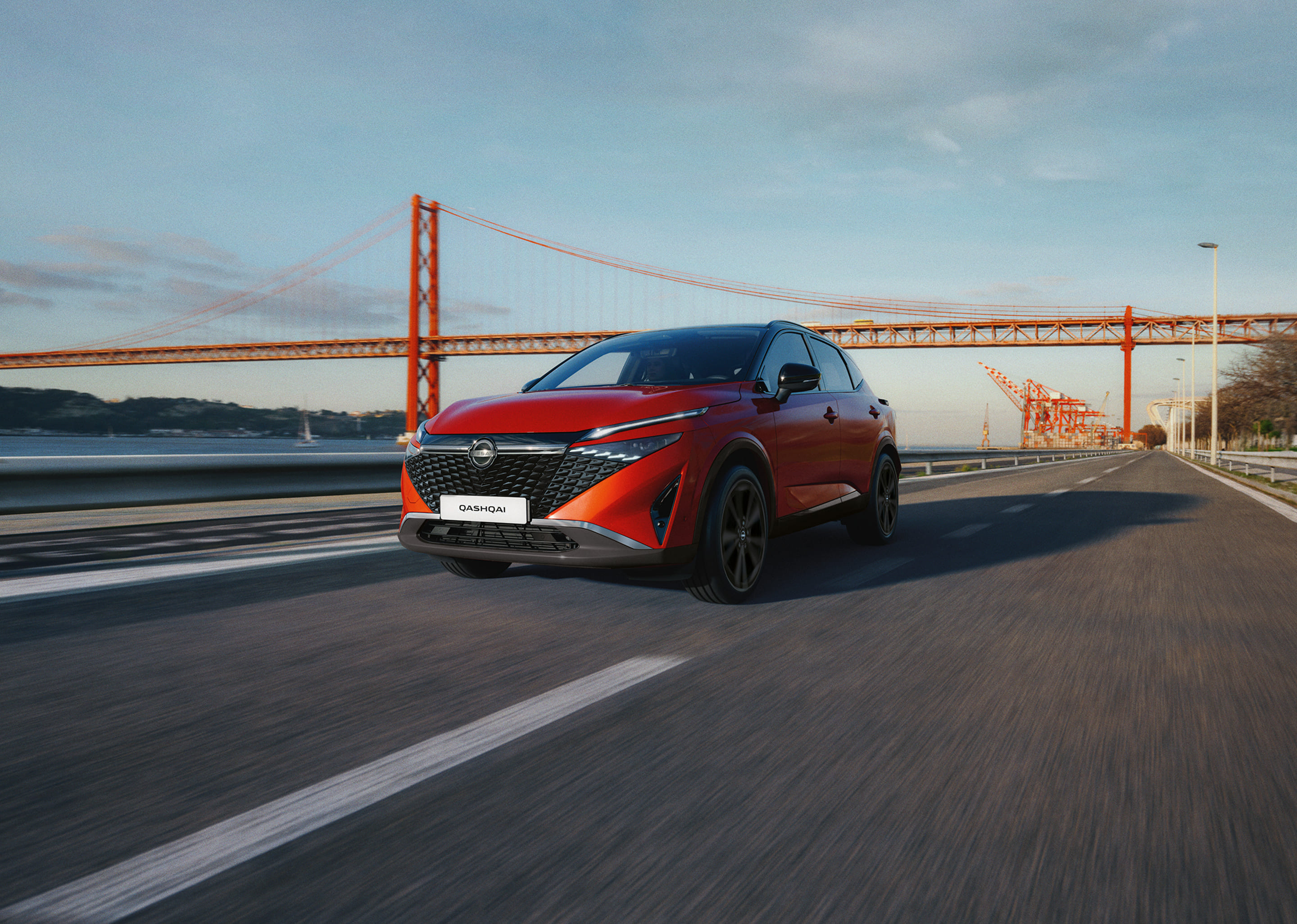 Nissan Qashqai e-Power driving shot on bridge - Hybrid SUV