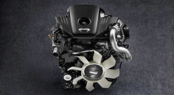 2021 Nissan Frontier showing 2.5 liter turbo diesel engine on black background