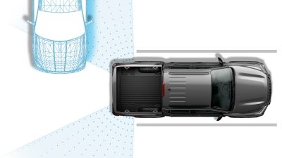 2021 Nissan Frontier illustrating intelligent rear cross traffic alert sensors