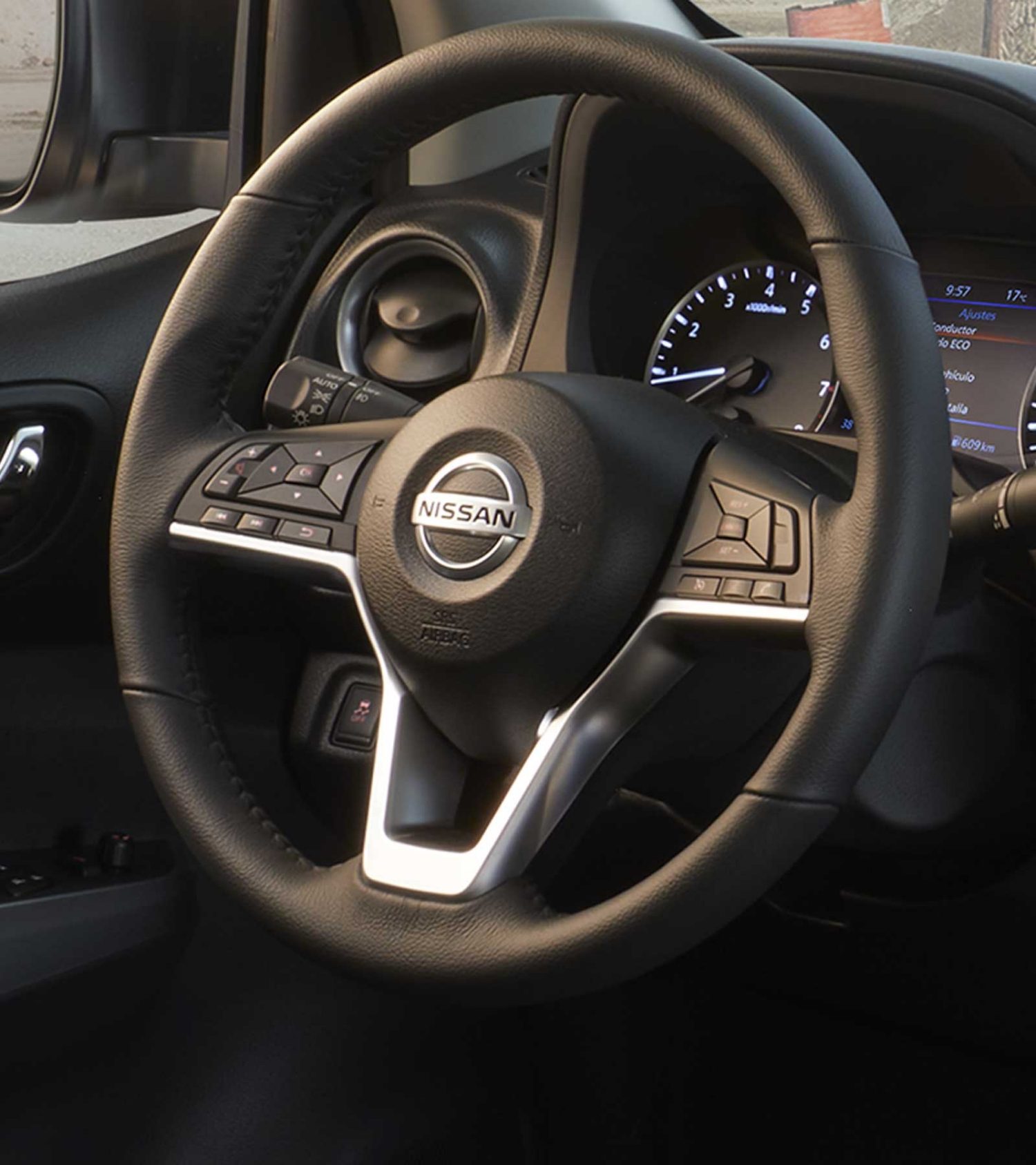 2021 Nissan Frontier rear seat with dog and person putting bags in