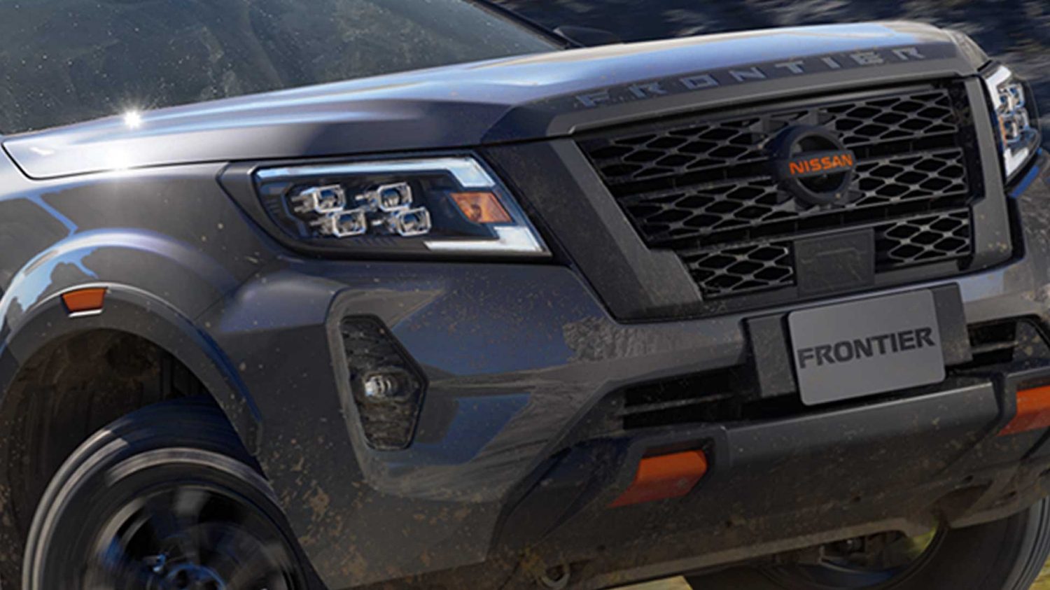 2021 Nissan Frontier PRO-4X 2021 using off-road technology to climb a rugged hill