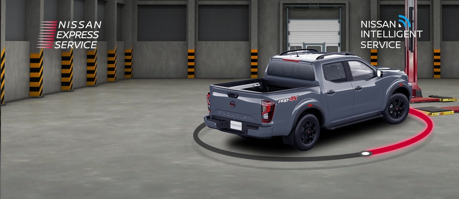 Vista lateral trasera 3/4 de Nissan VERSA Platinum CVT rojo burdeos con negro en Nissan Express Service Servicio en 60 minutos.