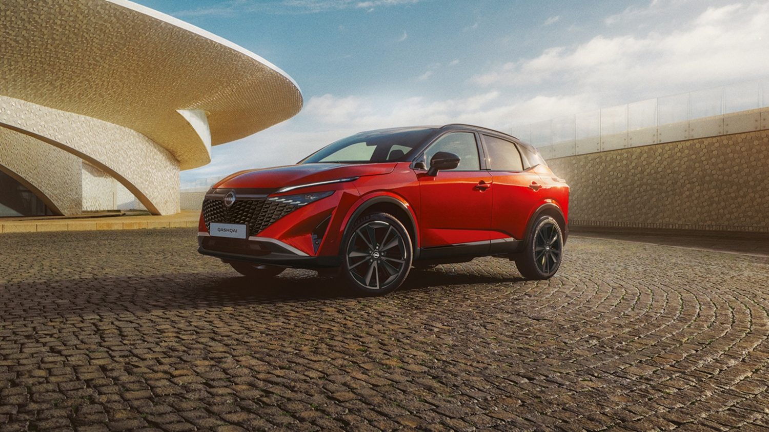 Nissan Qashqai e-Power 3/4 front static shot in front of building with woman walking towards car - Hybrid SUV