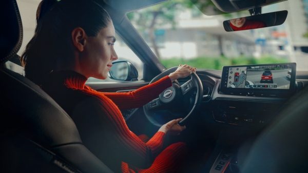 Nissan Qashqai e-Power driver side view onto dashboard & driving car